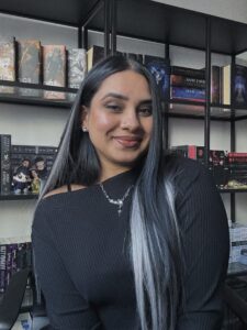 photo of female author in black top with silver and black hair